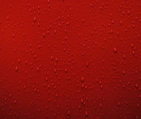 Water droplets on a red Silic One coating